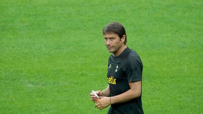 Tottenham's head coach Antonio Conte watches his players. AP Photo