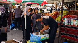 A man sells olives at a market in Deir Al Balah, central Gaza. Reuters