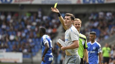 Michael Keane from Everton receives a yellow card during the pre-season friendly against Genk at Cristal Arena on July 22, 2017 in Genk, Belgium. Andy Astfalck / Getty Images