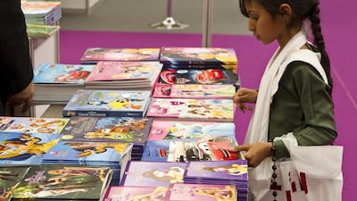 A young visitor at last year's Al Ain Reads book fair. Antonie Robertson / The National