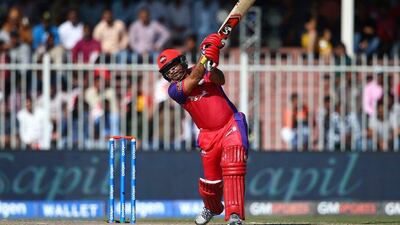 Virender Sehwag of Gemini Arabians bats during the Masters Champions League T20 match against Sagittarius Strikers on Friday. Francois Nel / Getty Images