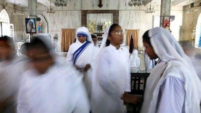 epa02697930 Nuns and christians leave a church after praying on Good Friday at a church in Calcutta, India, 22 April 2011. The crucifixion of Jesus Christ is celebrated on the occasion of Good Friday by the Christian community all over the world. EPA/PIYAL ADHIKARY *** Local Caption *** 02697930.jpg