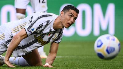 Juventus forward Cristiano Ronaldo is tackled during the Serie A match against Torino at the Olympic Stadium in Turin. AFP
