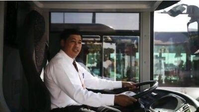 For Purna Bahadur Shrestha, a driver for the Big Bus Tours in Abu Dhabi, ferrying tourists is all in a day's work. Lee Hoagland/The National
