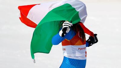 Gold medallist Sofia Goggia of Italy celebrates winning the women's downhill event. Leonhard Foeger / Reuters
