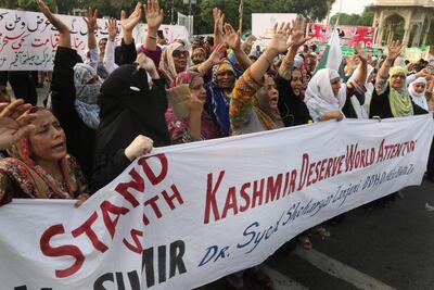 People shout slogans during a protest after the Indian government removed the special constitutional semi-autonomous status granted to the region of Kashmir, which both India and Pakistan claim, in Lahore, Pakistan. EPA