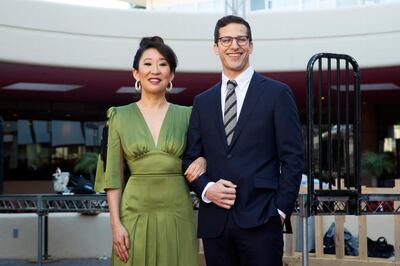 Sandra Oh and Andy Samberg are co-hosting this year's Golden Globes. AP