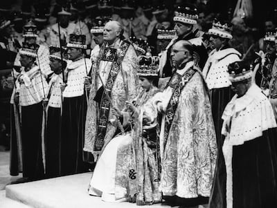 Queen Elizabeth II holding the royal sceptre and wearing St Edward's crown at Westminster Abbey. AP