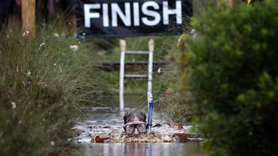 A male entrant takes part in the Irish Bog Snorkelling championship on Sunday. Charles McQuillan / Getty Images