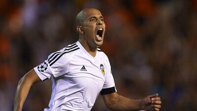 Sofiane Feghouli of Valencia celebrates scoring his team's third goal in Wednesday night's Champions League play-off first leg 3-1 win against AS Monaco. Manuel Queimadelos Alonso / Getty Images / August 19, 2015