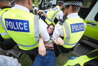 Protesters are detained by police outside Woolwich Crown Court for Palestine Action support. Yui Mok/PA Wire