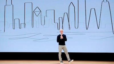 Apple CEO Tim Cook. The firm is said to be working on a touchless control feature for its iPhones. Jim Young / AFP