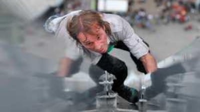 Alain Robert climbs a 33-storey building in Jakarta in 2008. He hopes to make the Burj Khalifa his next big challenge.