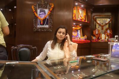 Tanya Rastogi, owner of Lala Jugal Kishore Jewellers at the counter of her shop in Lucknow’s Gole Market. Jitendra Prakash for The National
