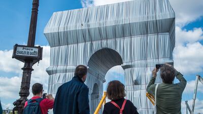 The Arc de Triomphe was wrapped as part of an art installation by late artists Christo and Jean Claude in Paris in September 2021. EPA