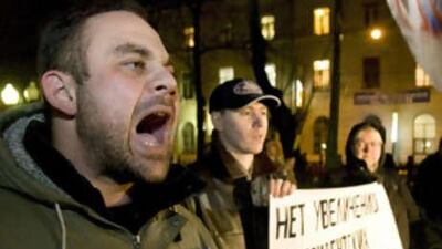 Supporters of the Other Russia opposition movement hold a placard reading 'No to extension of the Presidential Term!' during a demonstration in Moscow against the proposal of President Dmitry Medvedev.