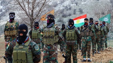 Iranian Kurdish fighters from the Kurdistan Freedom Party (PAK) take part in a training session. Reuters.