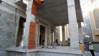 The temple's main entrance is beginning to take shape. Pawan Singh / The National