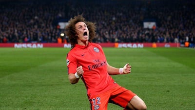 David Luiz of Paris Saint-Germain celebrates after scoring the leveller on Wednesday to force extra time against Chelsea as PSG advanced to the Champions League quarter-finals. Paul Gilham / Getty Images / March 11, 2015