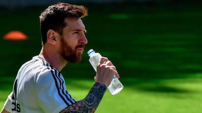 Argentina's Lionel Messi has some water during a training session in Belo Horizonte, state of Minas Gerais, Brazil, on June 18, 2019, on the eve of their Copa America football match against Paraguay. AFP