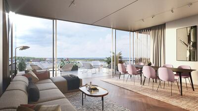 The living room at a trackside residence with views out over the circuit.