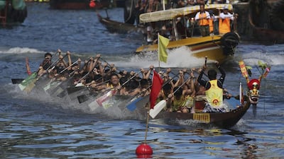 Participants compete in a dragon boat race in Hong Kong on Saturday during the Chinese Dragon Boat Festival. Kin Cheung / AP