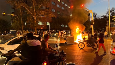 A protest in central Tehran over the death of Mahsa Amini, 22, who had been detained by the nation's morality police. AP
