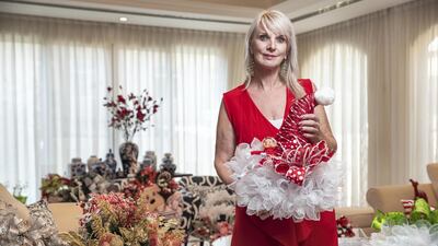 Janet Waite makes wreaths, centrepieces and even sells decorated trees. She has been extra busy early this year as people decorate well before Christmas in an effort to raise their spirits. Antonie Robertson / The National