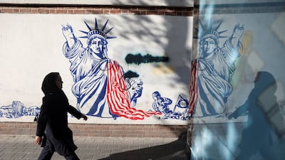 An anti-US mural in Tehran. Foreign Minister Abbas Araghchi said Iran would abide by its obligations under the nuclear Non-Proliferation Treaty. Reuters