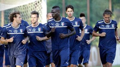 Mario Balotelli, centre, had said he was looking forward to meeting the Pope, but he was keener to prepare for the friendly against Argentina.