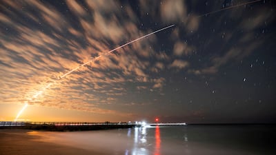 Scientists warn the Earth's atmosphere will be able to hold fewer satellites due to climate change. Reuters