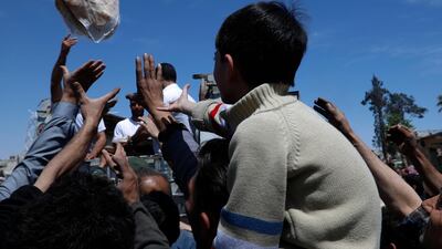 Bread distributed in destroyed Douma near Damascus, the site of a suspected chemical weapons attack. Hassan Ammar / AP