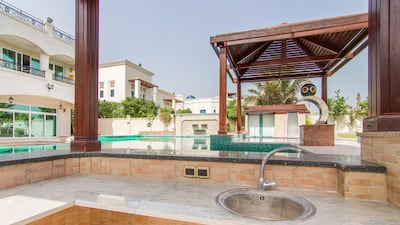 The outdoor kitchen can be used when holding parties. Courtesy Luxhabitat