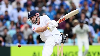 Gus Atkinson is bowled by Mohammad Siraj. Getty Images