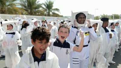 Children cheer as the new world record is announced.