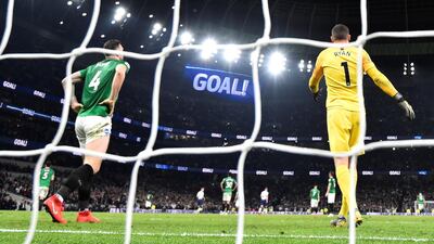Brighton's Mathew Ryan and Shane Duffy react after Tottenham's Christian Eriksen scored their first goal in the 88th minute. Reuters