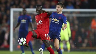 Ander Herrera, right, was deemed man of the match for his role in Manchester United's draw at Anfield. Dave Thompson / AP Photo