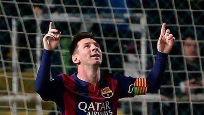 Barcelona forward Lionel Messi celebrates after scoring his thrid goal during their UEFA Champions League football match against Apoel at the Neo GSP Stadium in the Cypriot capital, Nicosia, on November 25, 2014. AFP PHOTO/PATRICK BAZ