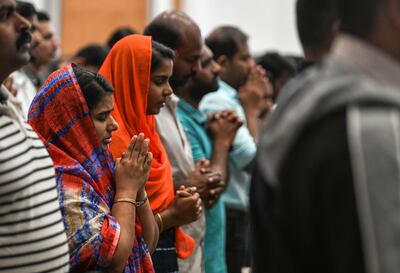Worshippers at the Malayalam language Mass at St Paul's. Khushnum Bhandari for The National