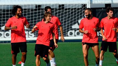 Marcelo, Luka Modric, Karim Benzema, and Alvaro Odriozola take part in a training session. AFP