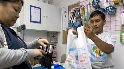 The value of transactions using credit cards rose by more than 50 per cent to Dh109.6 billion in 2012. Jaime Puebla / The National