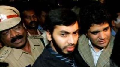 The Indian doctor Mohammed Haneef, centre, at Bangalore Airport in 2007.