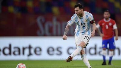 Lionel Messi scores a penalty for Argentina against Chile. EPA