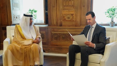 Syrian President Bashar Al Aassad receives President Sheikh Mohamed's invitation from Abdul Hakeem Al Nuaimi, charge d'affaires of the UAE Embassy in Damascus. Photo: UAE Embassy Damascus / Twitter