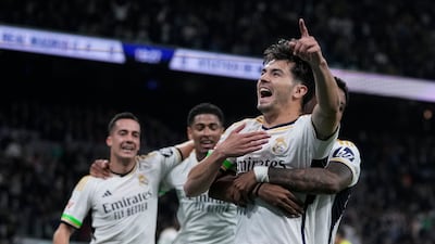 Real Madrid's Brahim Diaz, second from right, celebrates with teammates after scoring the opening goal during the Spanish La Liga soccer match between Real Madrid and Atletico Madrid at the Santiago Bernabeu stadium in Madrid, Spain, Sunday, Feb. 4, 2024. (AP Photo / Bernat Armangue)