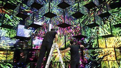 Workers make final preparations at the IFA consumer electronics fair in Berlin. Fabrizio Bensch / Reuters