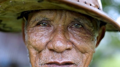Above, a rice farmer in Udon Thani, Thailand. Jorge Silva / Reuters