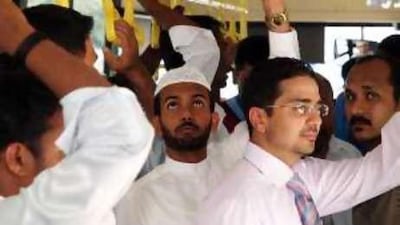 Passengers ride one of the new public buses along Al Salam street in Abu Dhabi.