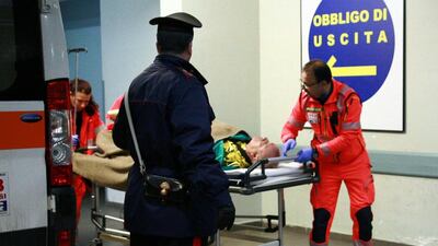 An injured passenger arrives at the Antonio Perrino hospital in Brindisi, southern Italy, rescued from the burning ferry “Norman Atlantic” adrift off the coast of Albania. Renato Esposito / AFP