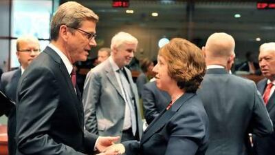 German foreign affairs minister Guido Westerwelle and the EU’s foreign policy chief, Catherine Ashton, talk before the extraordinary EU meeting roundly condemned the bloodshed in Egypt.
